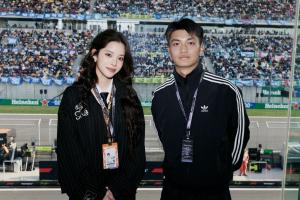 蒯纪闻现场观战F1，与欧阳娜娜合照